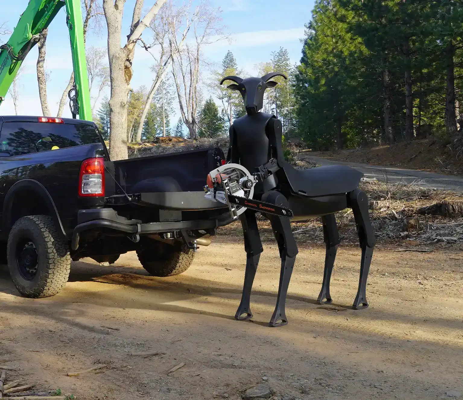 the threehalves robot at a forestry site holding a chainsaw